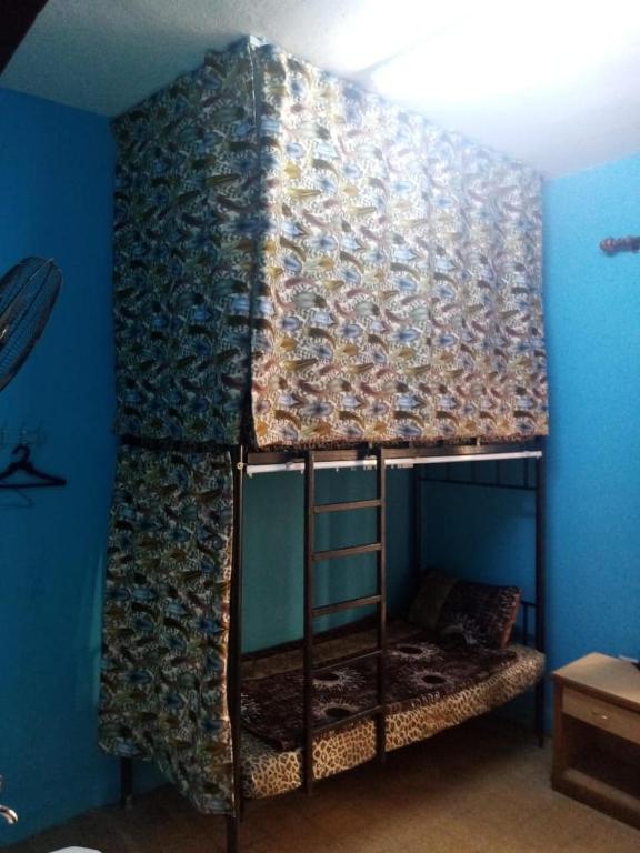 Postel nebo postele na pokoji v ubytování Cliff Hostel