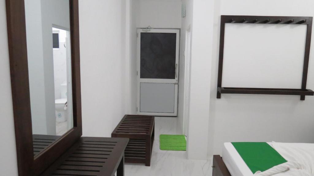 Postel nebo postele na pokoji v ubytování Senomaal Sigiri Resort