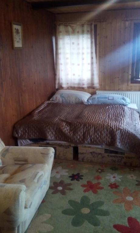 Postel nebo postele na pokoji v ubytování Guest House Leona