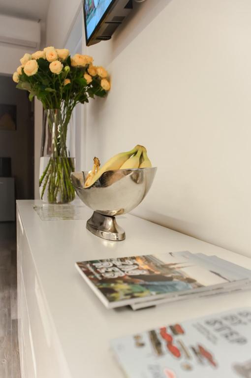 Televízia a/alebo spoločenská miestnosť v ubytovaní B&B Concept