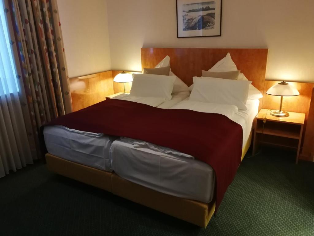 Postel nebo postele na pokoji v ubytování Hotel An der Philharmonie