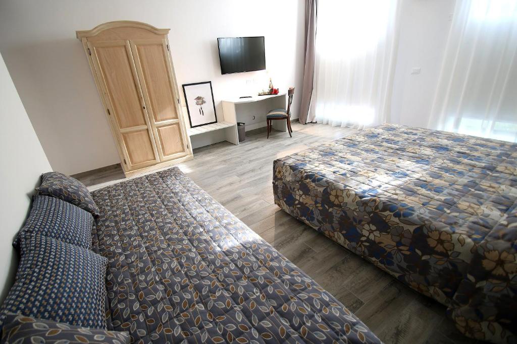 Postel nebo postele na pokoji v ubytování Resilienza