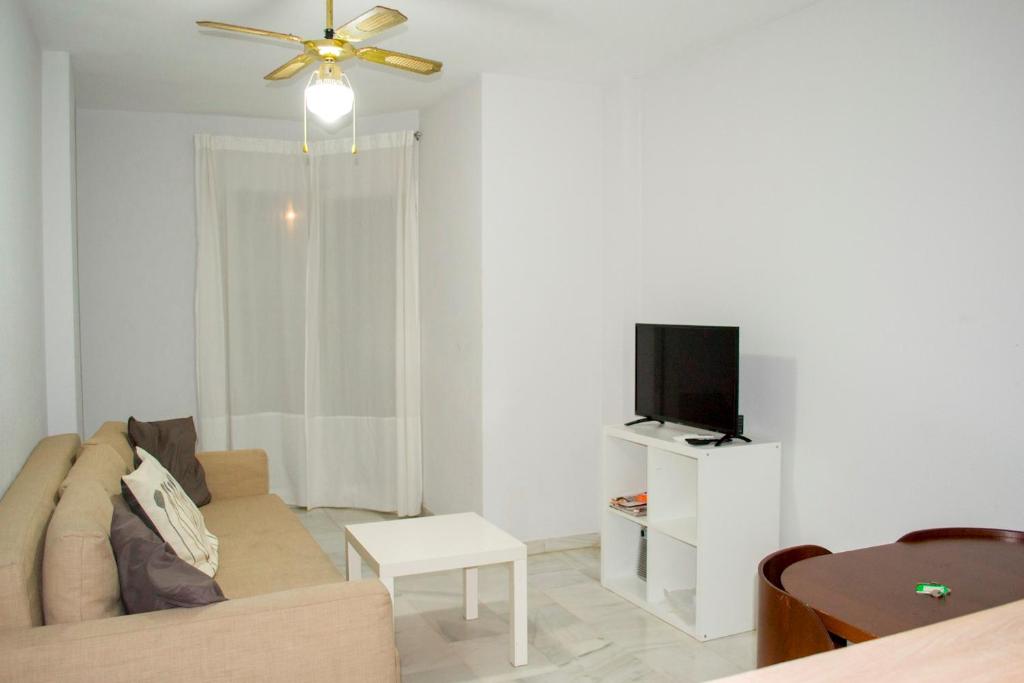 TV a/nebo společenská místnost v ubytování Oceanfront