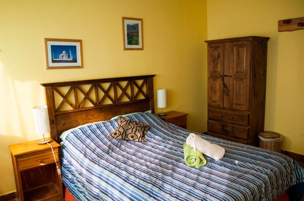 Postel nebo postele na pokoji v ubytování Patagonia Jazz Hostel