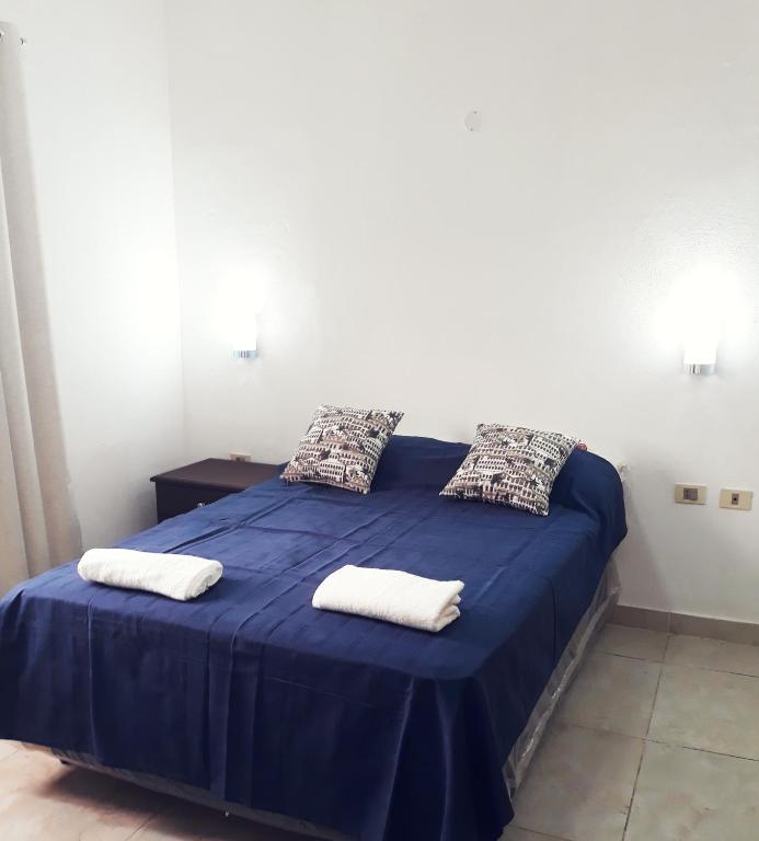 Cama o camas de una habitación en Las Salinas Hostal