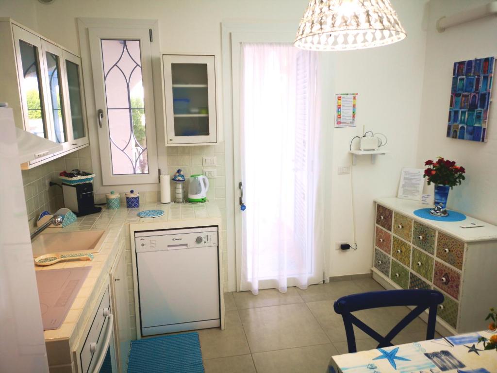 A kitchen or kitchenette at TorreBlu Residence