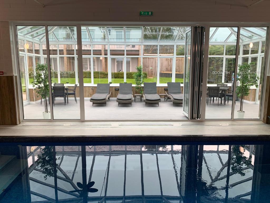 a view of the pool from the inside of a building at Heywood Spa Hotel in Tenby