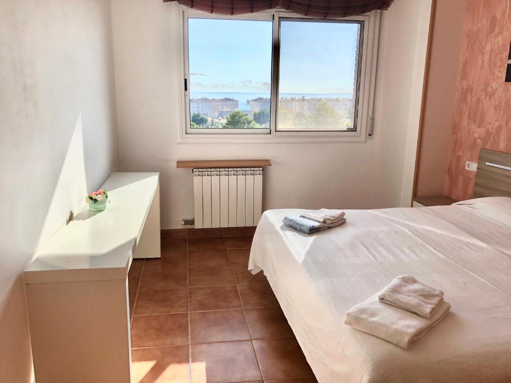 Postel nebo postele na pokoji v ubytování Casa con vistas al mar