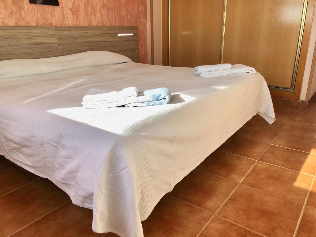 Postel nebo postele na pokoji v ubytování Casa con vistas al mar