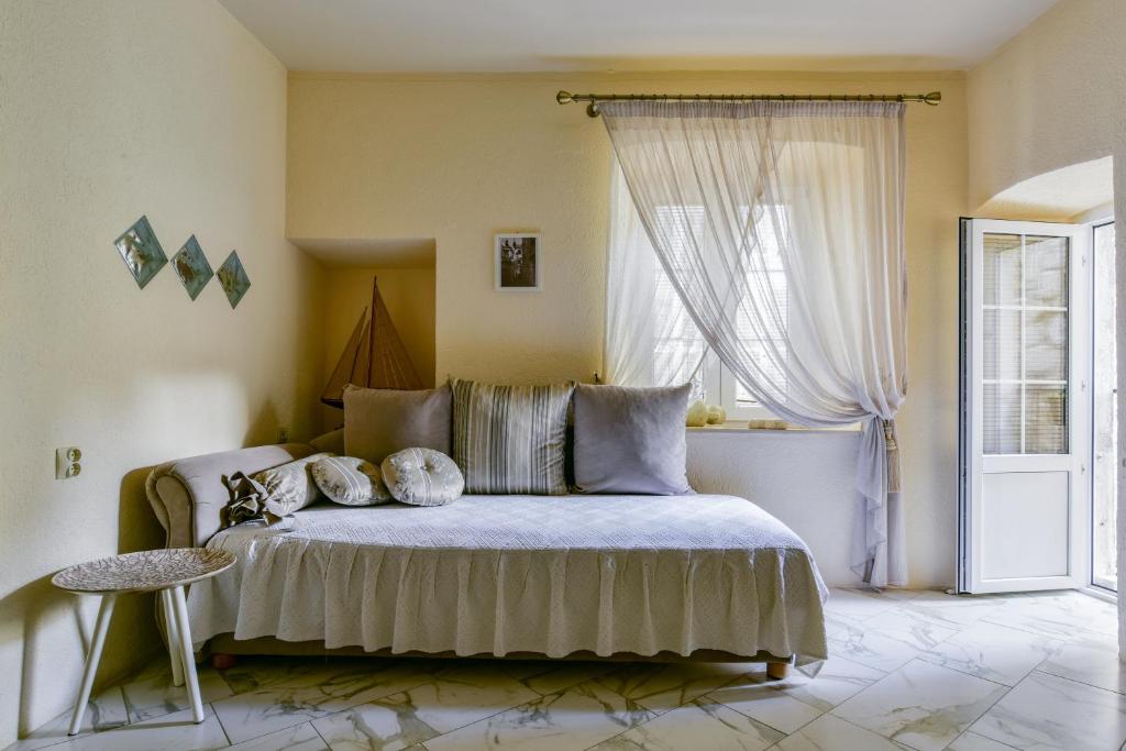 Кровать или кровати в номере Sea Paradise Apartment