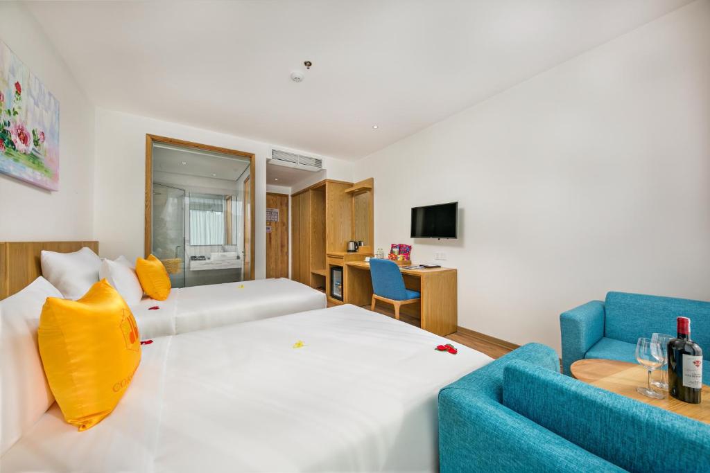 Postel nebo postele na pokoji v ubytování Cordial Beach Hotel Da Nang