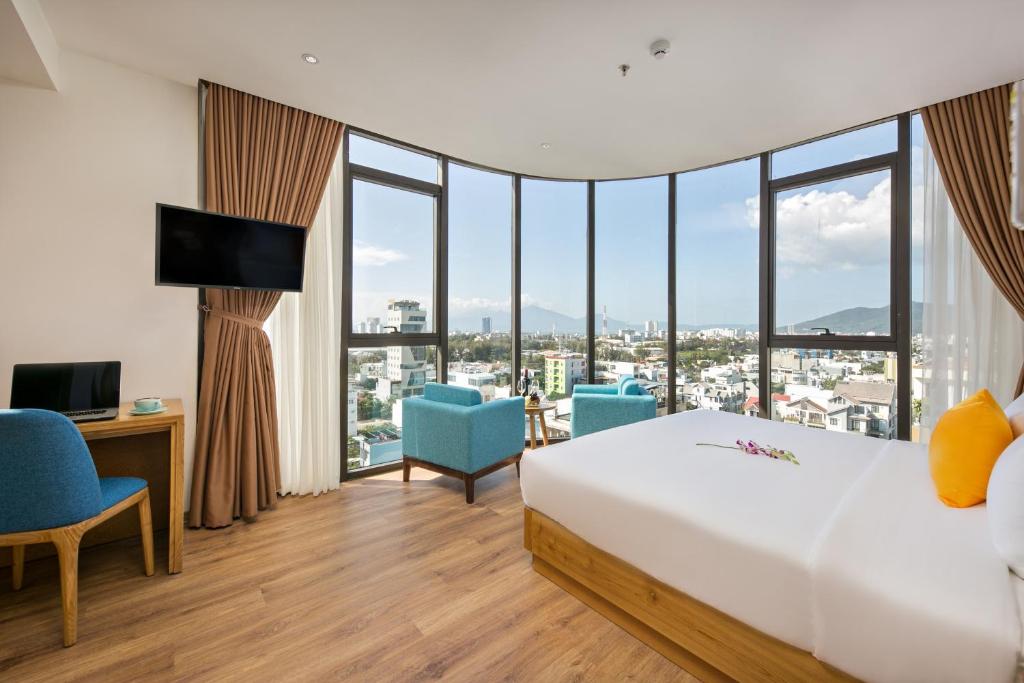 Postel nebo postele na pokoji v ubytování Cordial Beach Hotel Da Nang