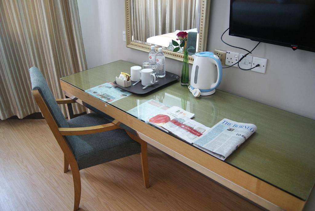 Příslušenství pro přípravu čaje a kávy v ubytování Tang Dynasty Hotel