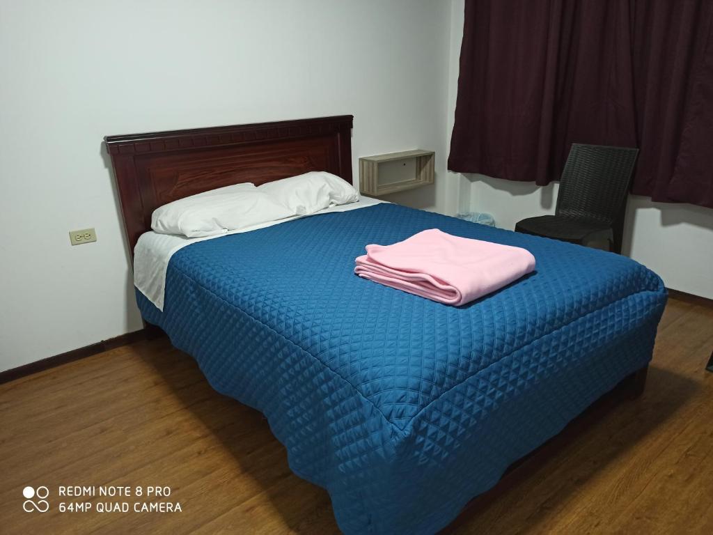 Postel nebo postele na pokoji v ubytování Habitaciones Alkimya