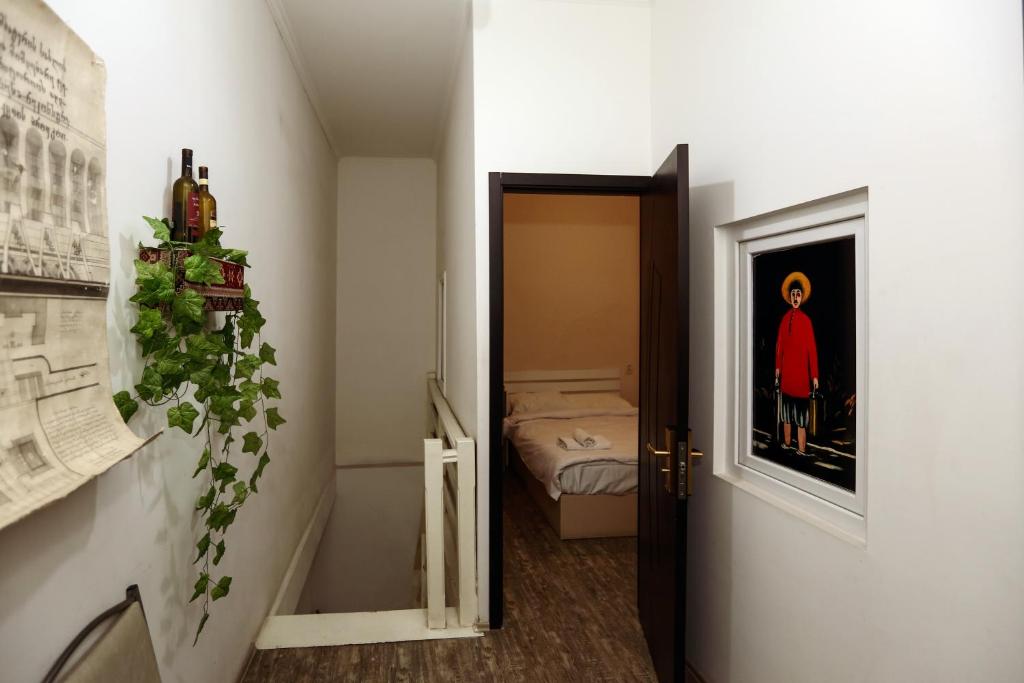 Postel nebo postele na pokoji v ubytování Hotel Rustaveli 36