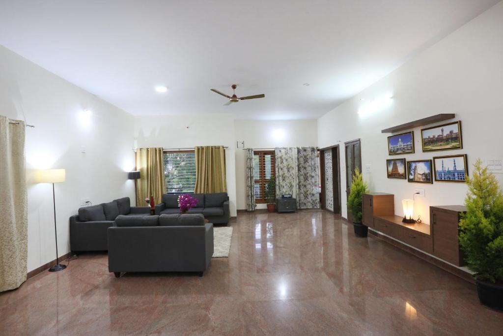 Posezení v ubytování LikeMyHome Homestay Mysore