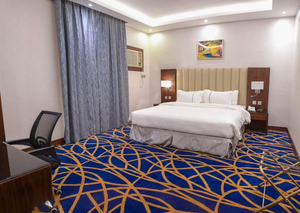 Postel nebo postele na pokoji v ubytování فندق قوبا إن - Quba Inn Hotel