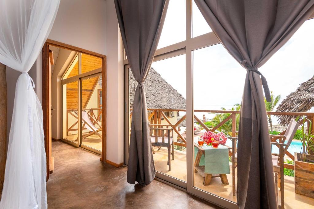 Balkón nebo terasa v ubytování Clove Island Villas & Spa