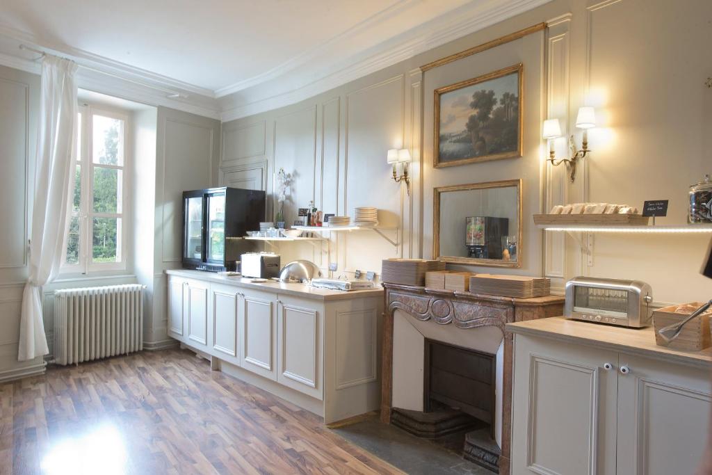 Kuchyň nebo kuchyňský kout v ubytování Château & Spa De La Commanderie