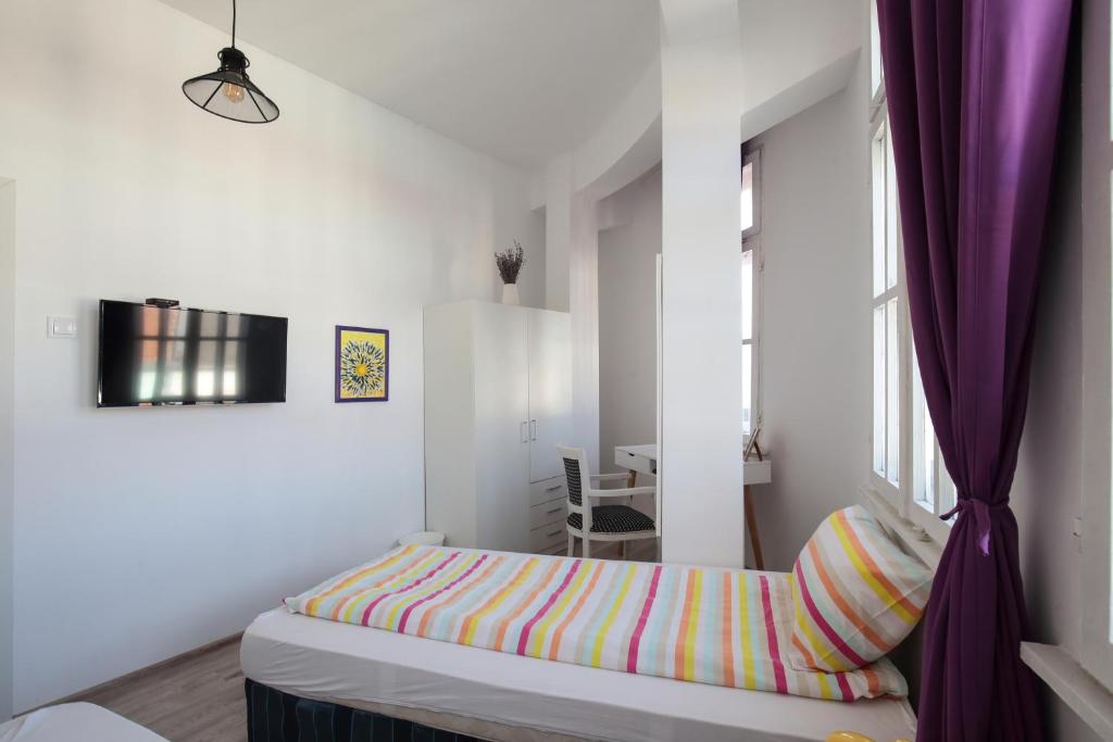 Postel nebo postele na pokoji v ubytování Hostel Musala