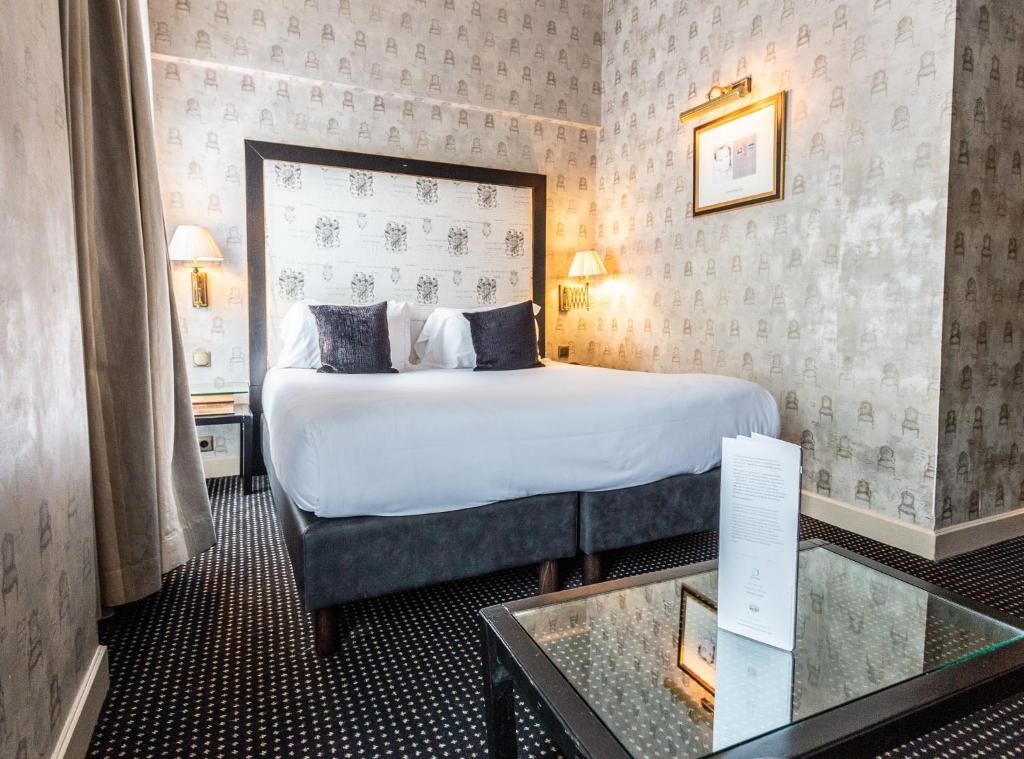 Voodi või voodid majutusasutuse Villa Lutèce Port Royal toas