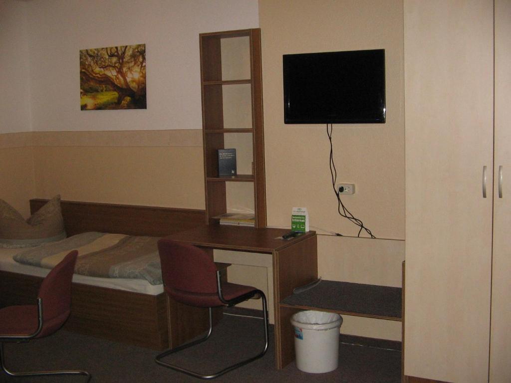 TV a/nebo společenská místnost v ubytování Pension "City"