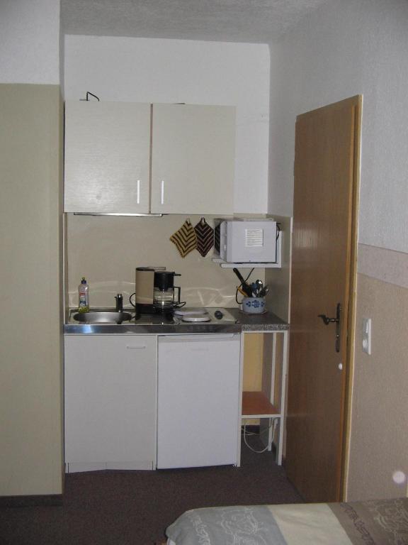 Kuchyň nebo kuchyňský kout v ubytování Pension "City"