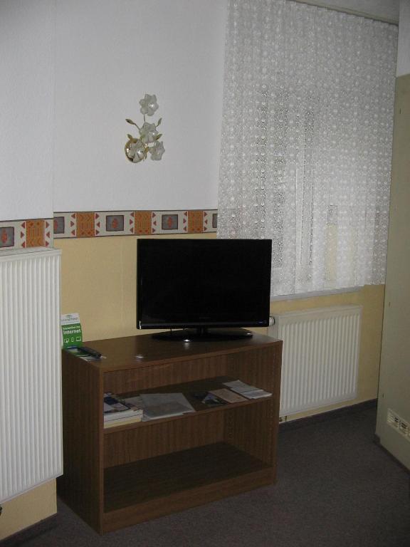 TV a/nebo společenská místnost v ubytování Pension "City"
