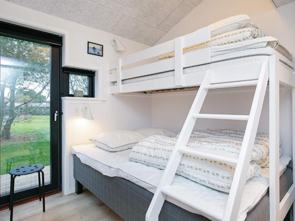 Postel nebo postele na pokoji v ubytování Luxury Retreat in Lonstrup-By Traum