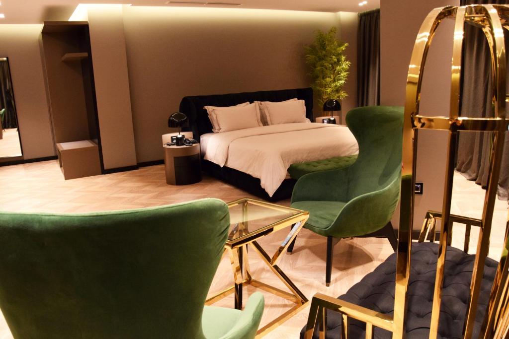 Postel nebo postele na pokoji v ubytování Hotel Unik