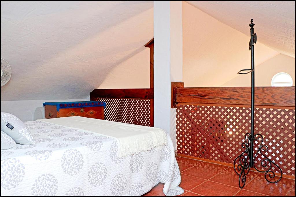 Postel nebo postele na pokoji v ubytování Casa Roche Viejo