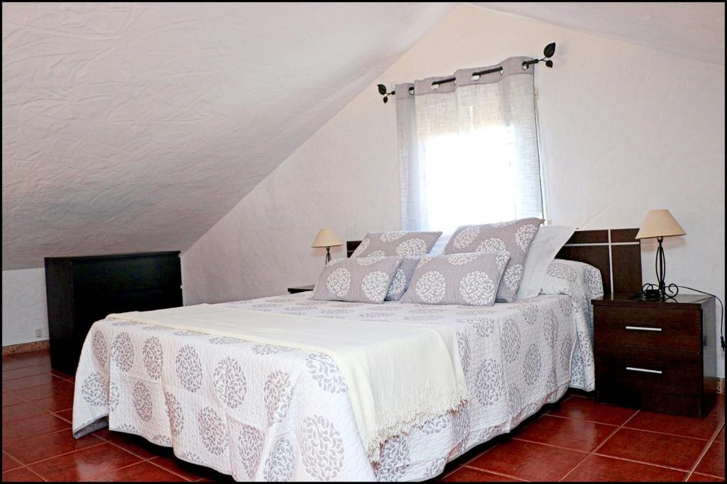 Postel nebo postele na pokoji v ubytování Casa Roche Viejo