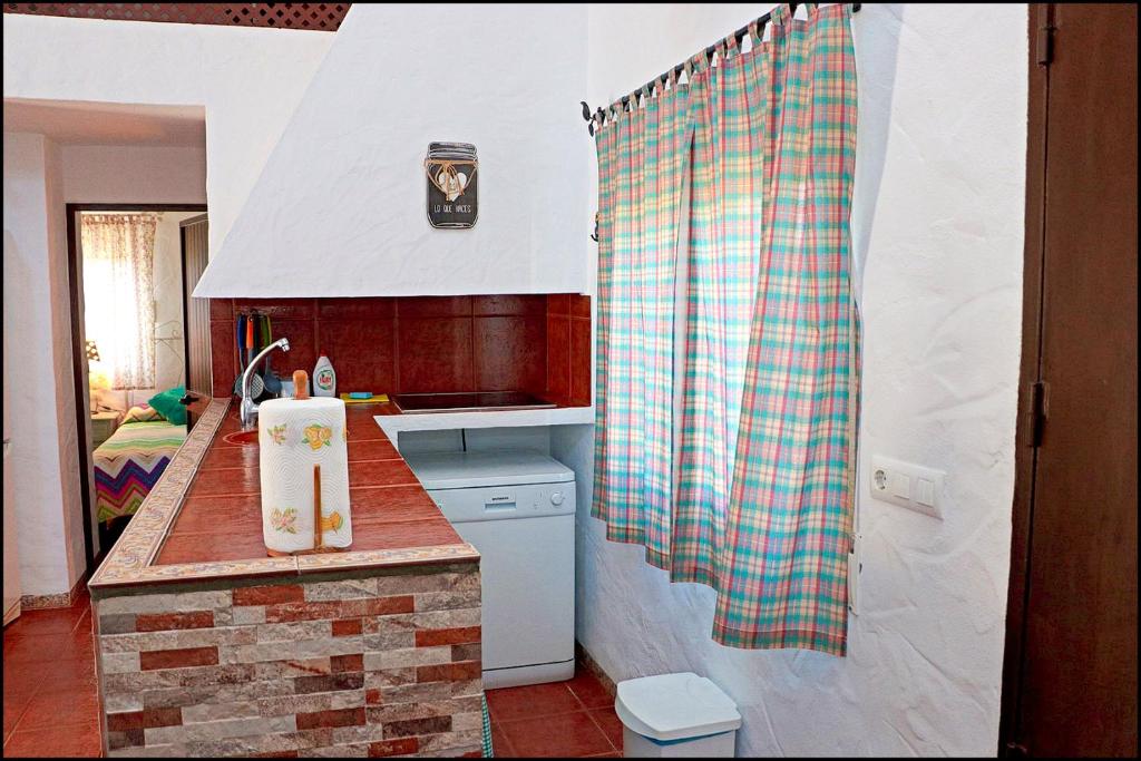 Kuchyň nebo kuchyňský kout v ubytování Casa Roche Viejo