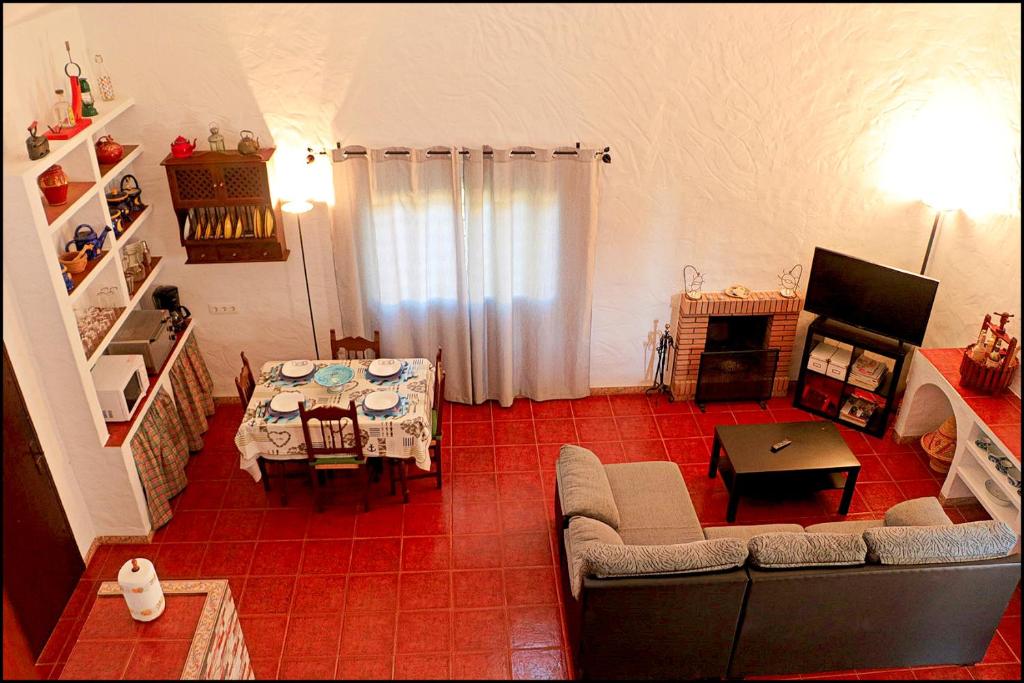 TV a/nebo společenská místnost v ubytování Casa Roche Viejo