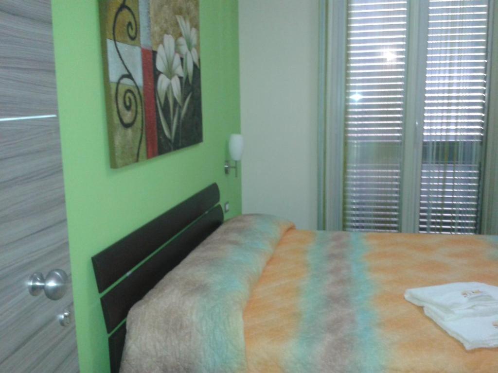 Łóżko lub łóżka w pokoju w obiekcie Suliccenti b&b Marzamemi