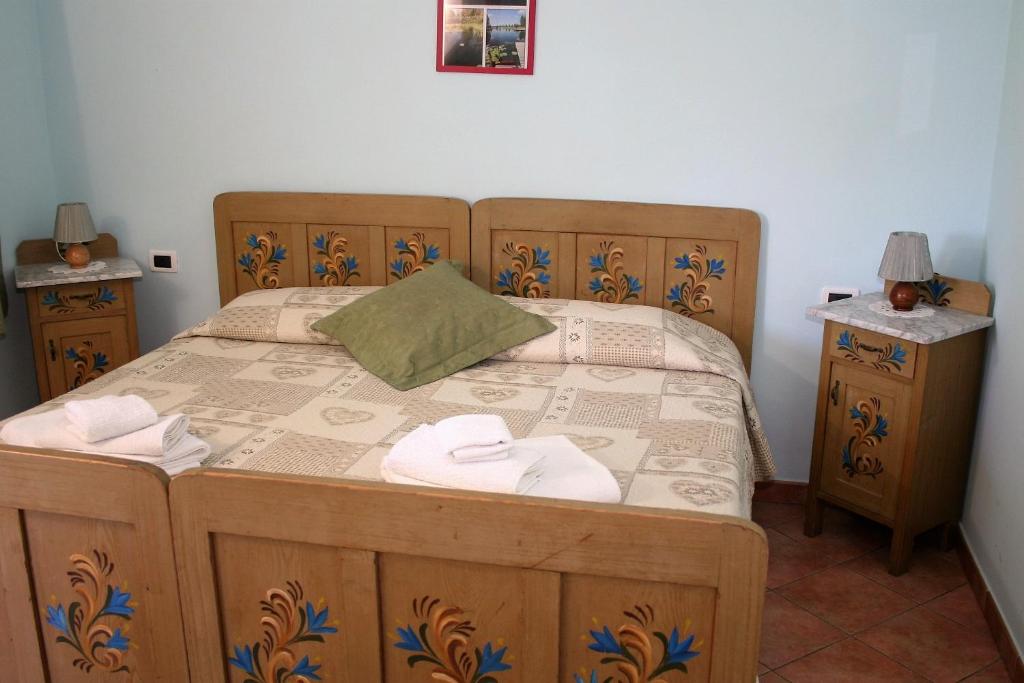 Posteľ alebo postele v izbe v ubytovaní Agriturismo Ai Due Laghi