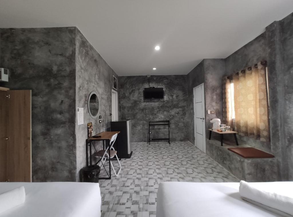 Postel nebo postele na pokoji v ubytování 4 Corner Khaoyai