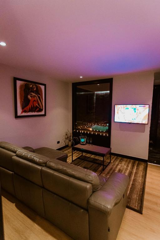 TV a/nebo společenská místnost v ubytování Privilege Hotel & Spa