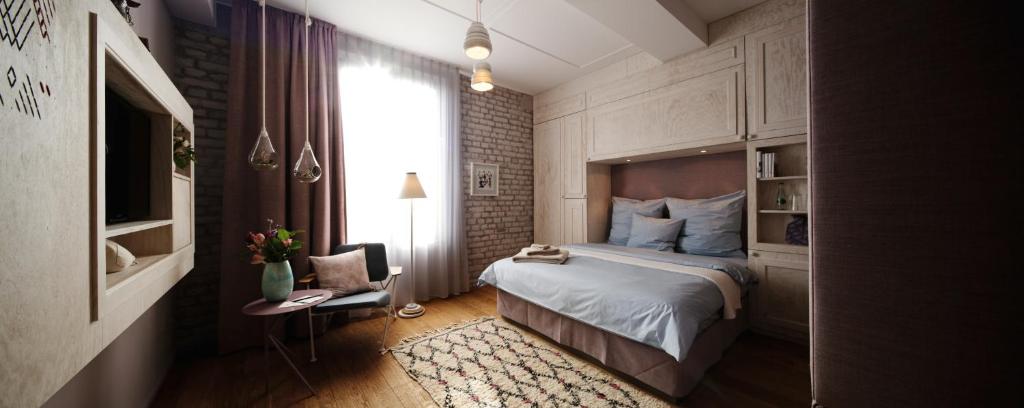 Een bed of bedden in een kamer bij Libertine Lindenberg