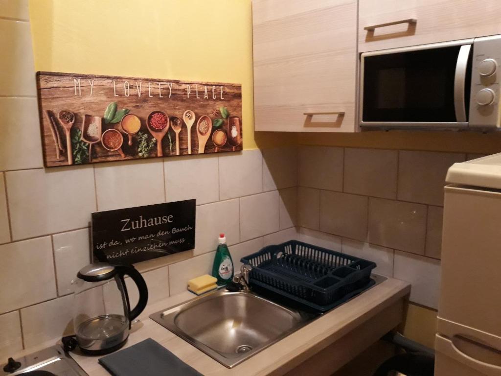 Kuchyň nebo kuchyňský kout v ubytování Monterooms Vienna Schönbrunn 10 minutes to downtown