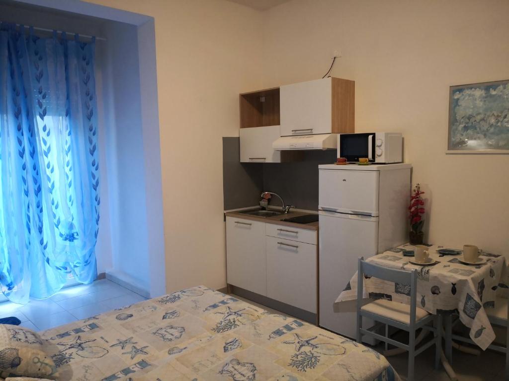 Kuchyň nebo kuchyňský kout v ubytování Residence BluAdria