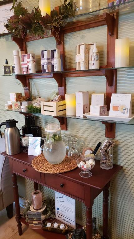 a shelf with a table with food on it at The Lakehouse Inn Geneva in Geneva-on-the-Lake