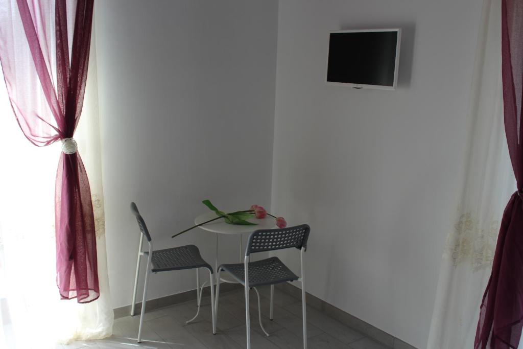 TV a/nebo společenská místnost v ubytování B&B Magma