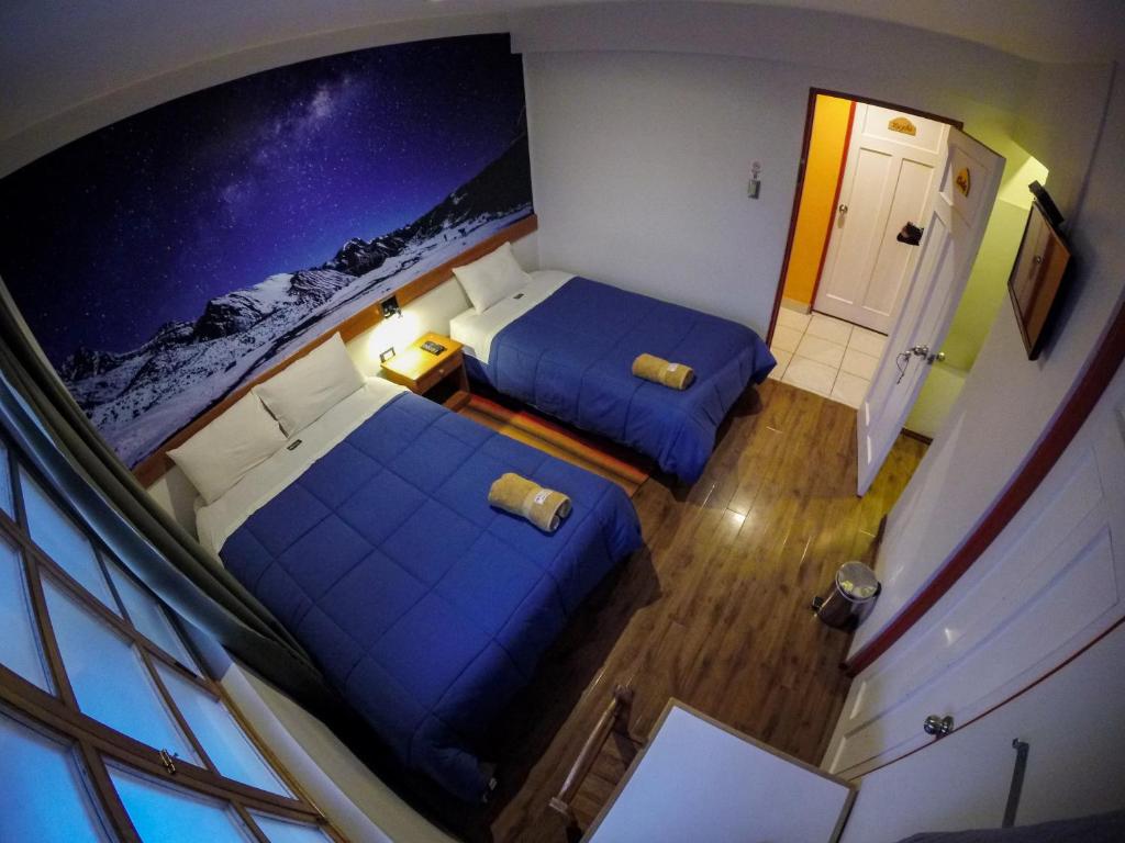 Letto o letti in una camera di Net House Cusco