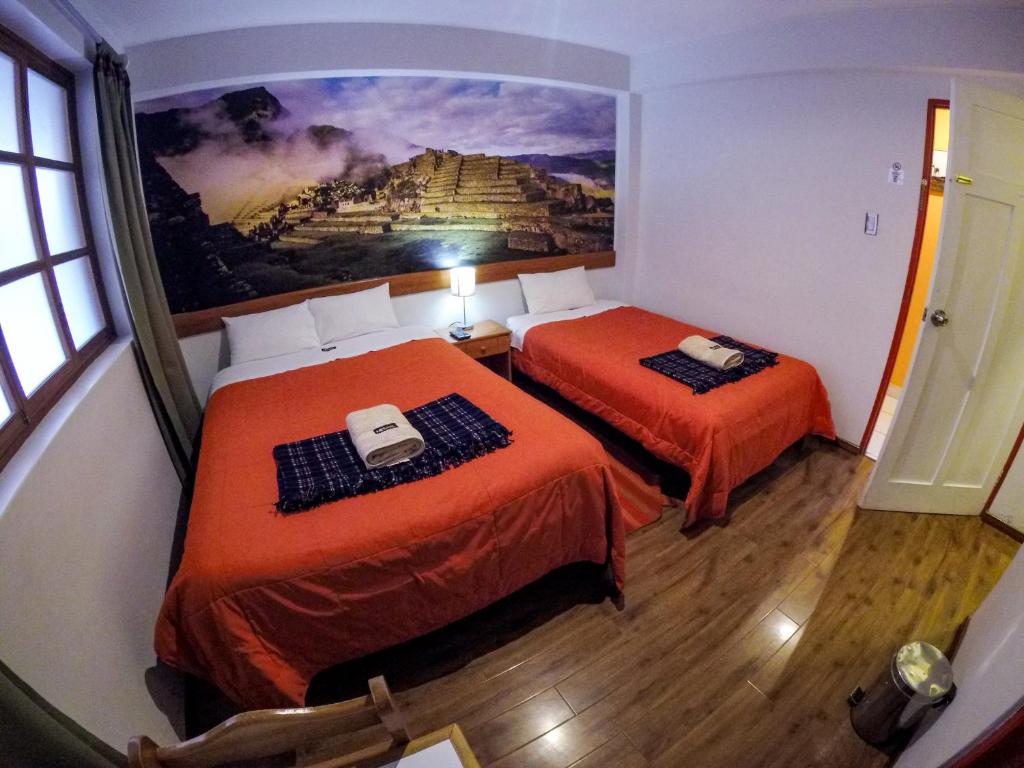 Letto o letti in una camera di Net House Cusco