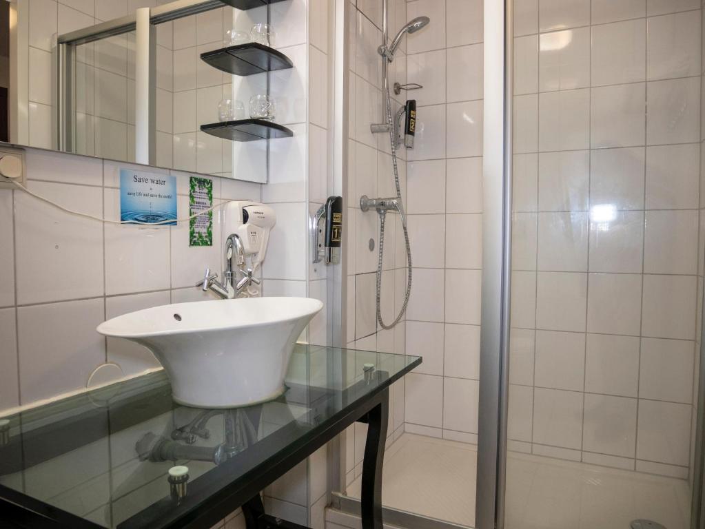 Koupelna v ubytování Hotel Hague Center