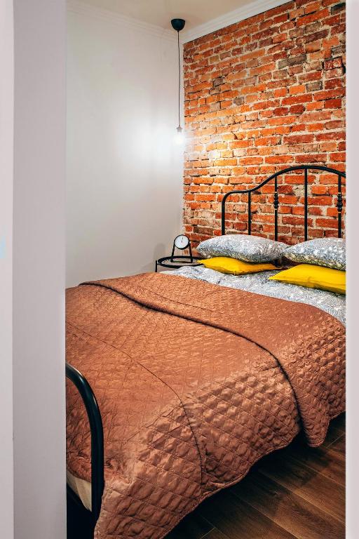 Posteľ alebo postele v izbe v ubytovaní Cosy Apartment