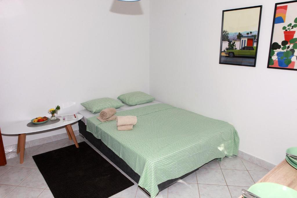 Posteľ alebo postele v izbe v ubytovaní Apartment Magnolija - free parking