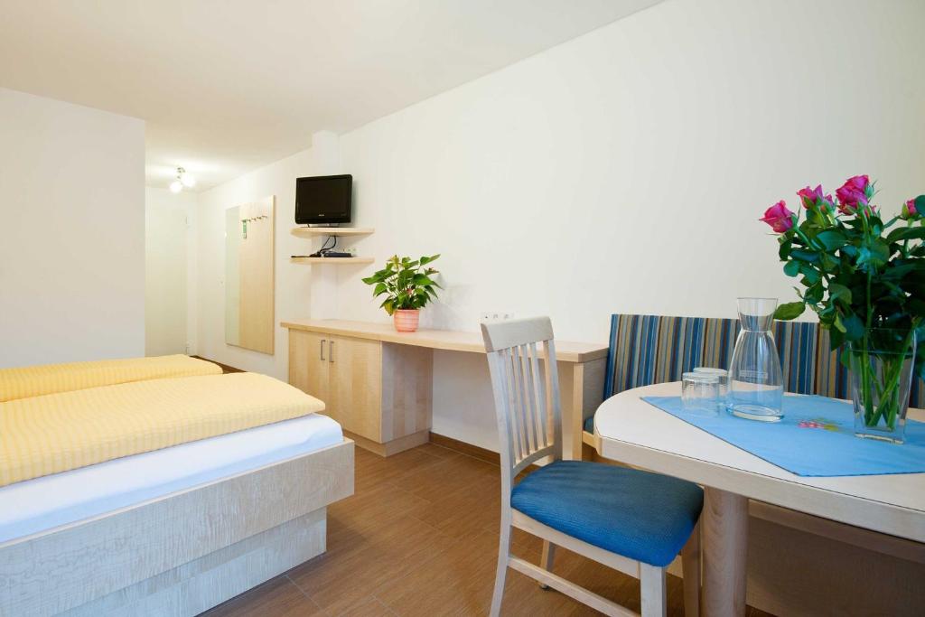 Postel nebo postele na pokoji v ubytování Landhaus Taurer