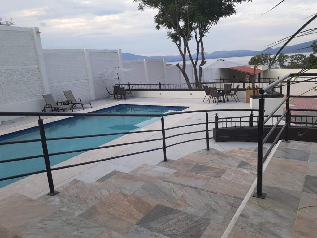 Bazén v ubytování HOTEL CANDELERO nebo v jeho okolí